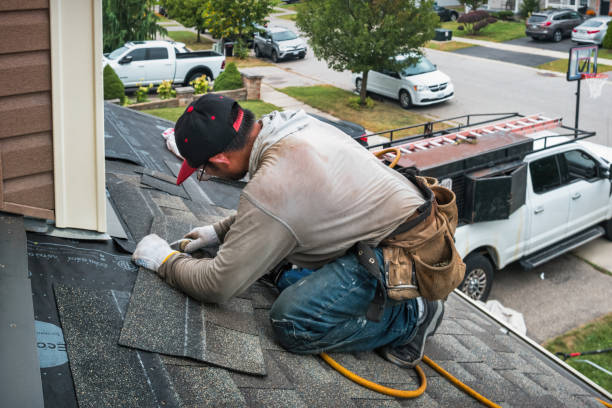 Professional Roof Replacement technician working in Stanley, NY
